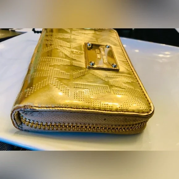 : "Michael Kors Gold-Tone Studded Zip-Around Wallet - Picture 6 of 7